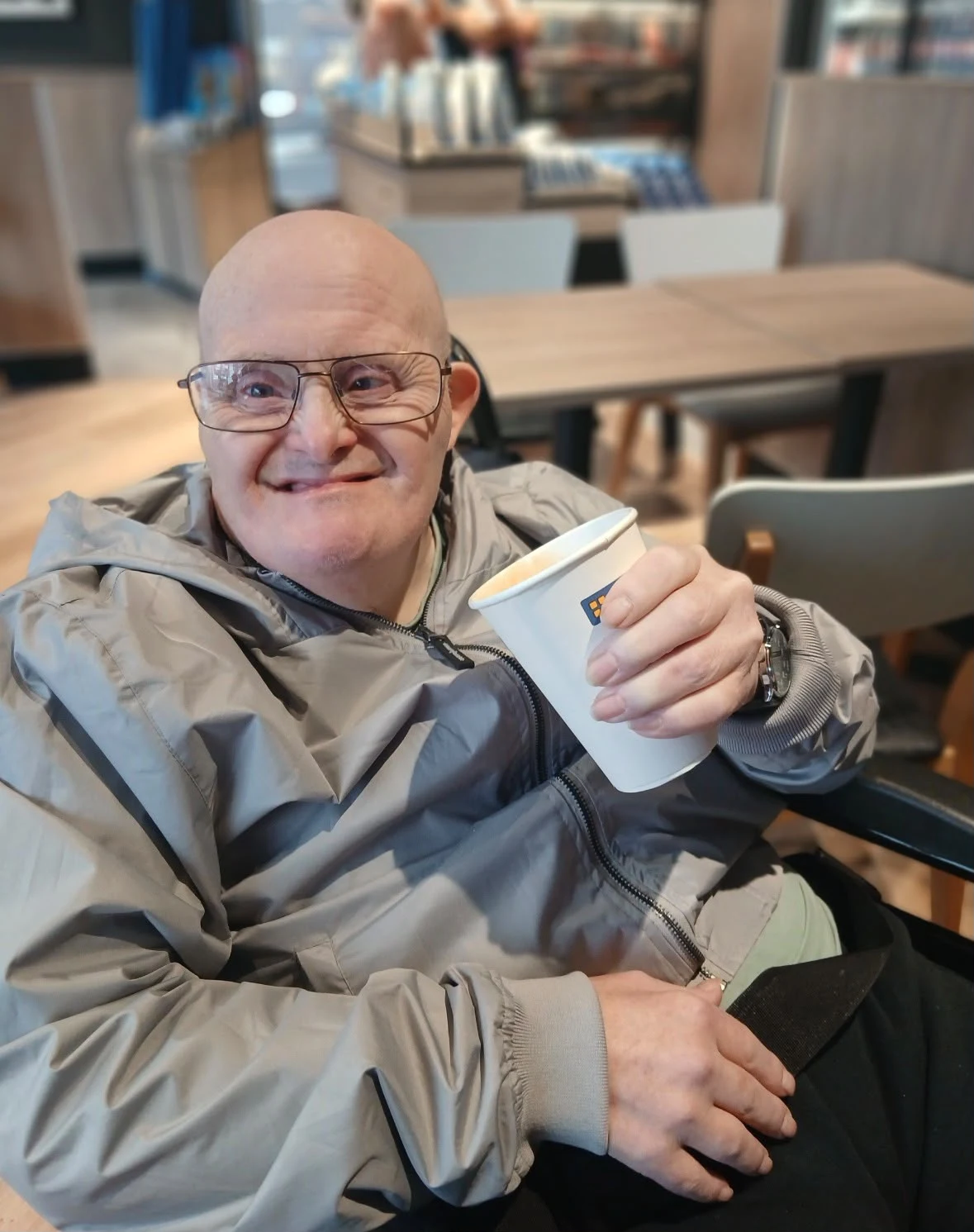 A man enjoying a cup of coffee